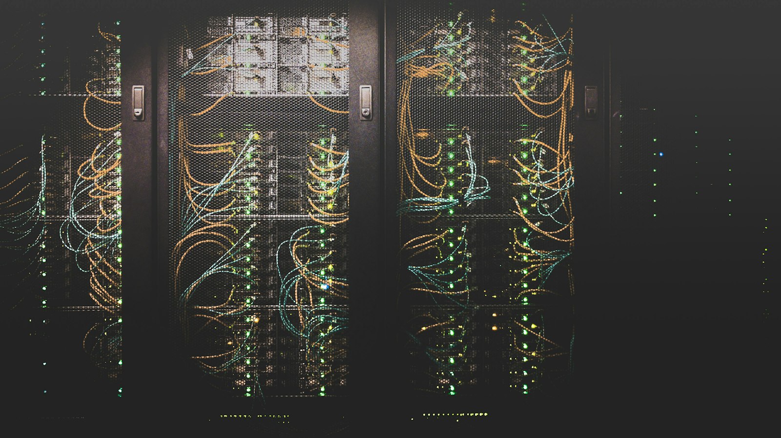 Server racks with neatly routed network cabling in a data center